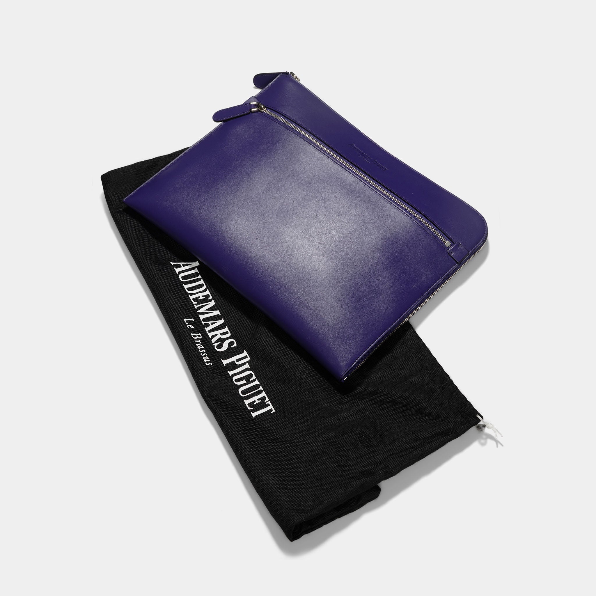 Audemars Piguet purple leather clutch