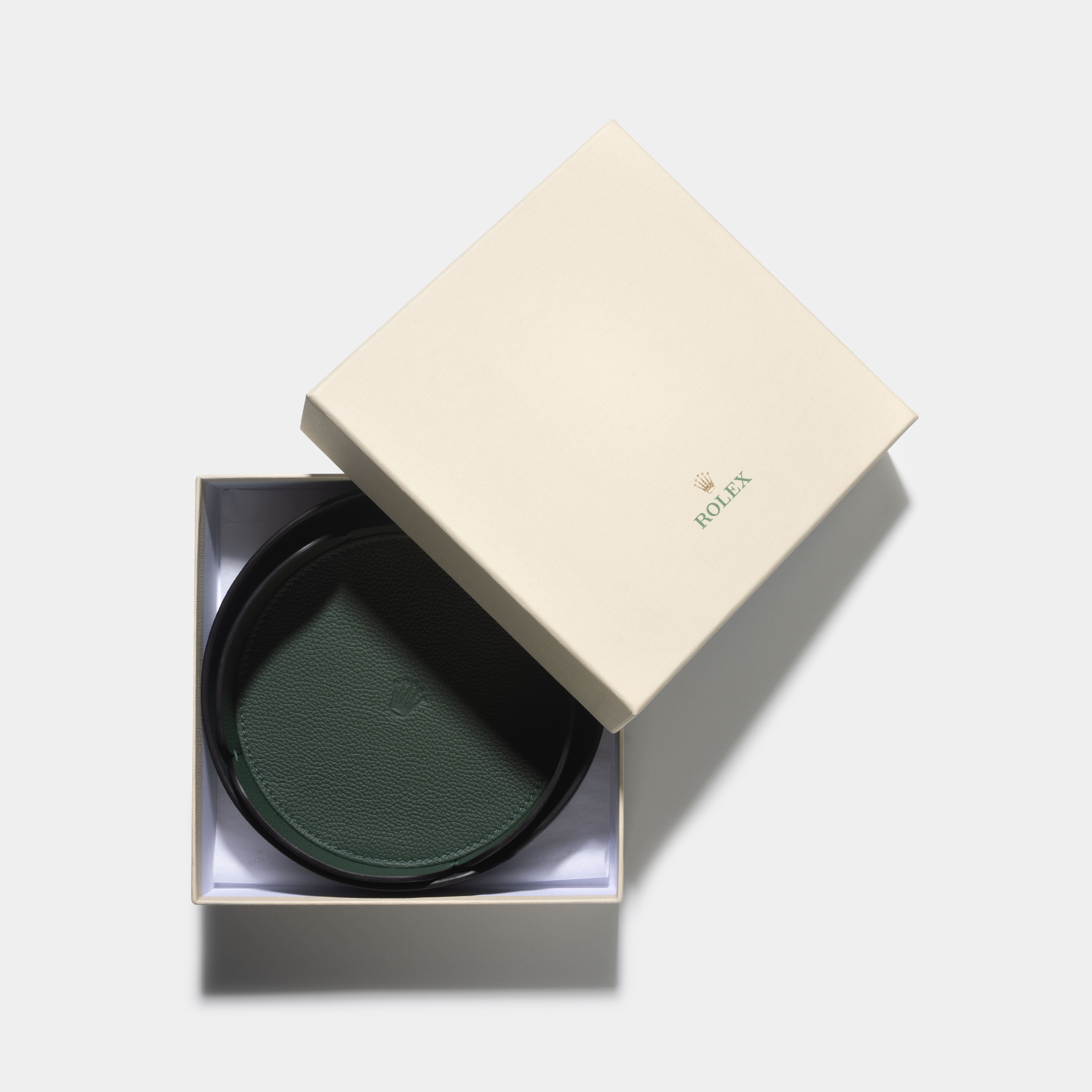 Rolex Set of Two Green Leather Organisers Trays