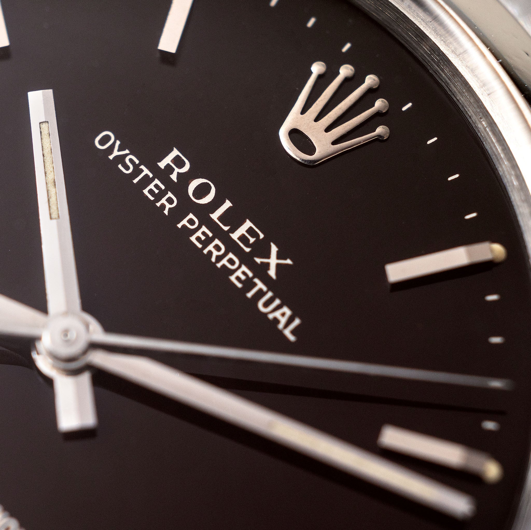 Rolex Oyster Perpetual 1002 "Burgundy Tropical Gilt Dial" with punched paper
