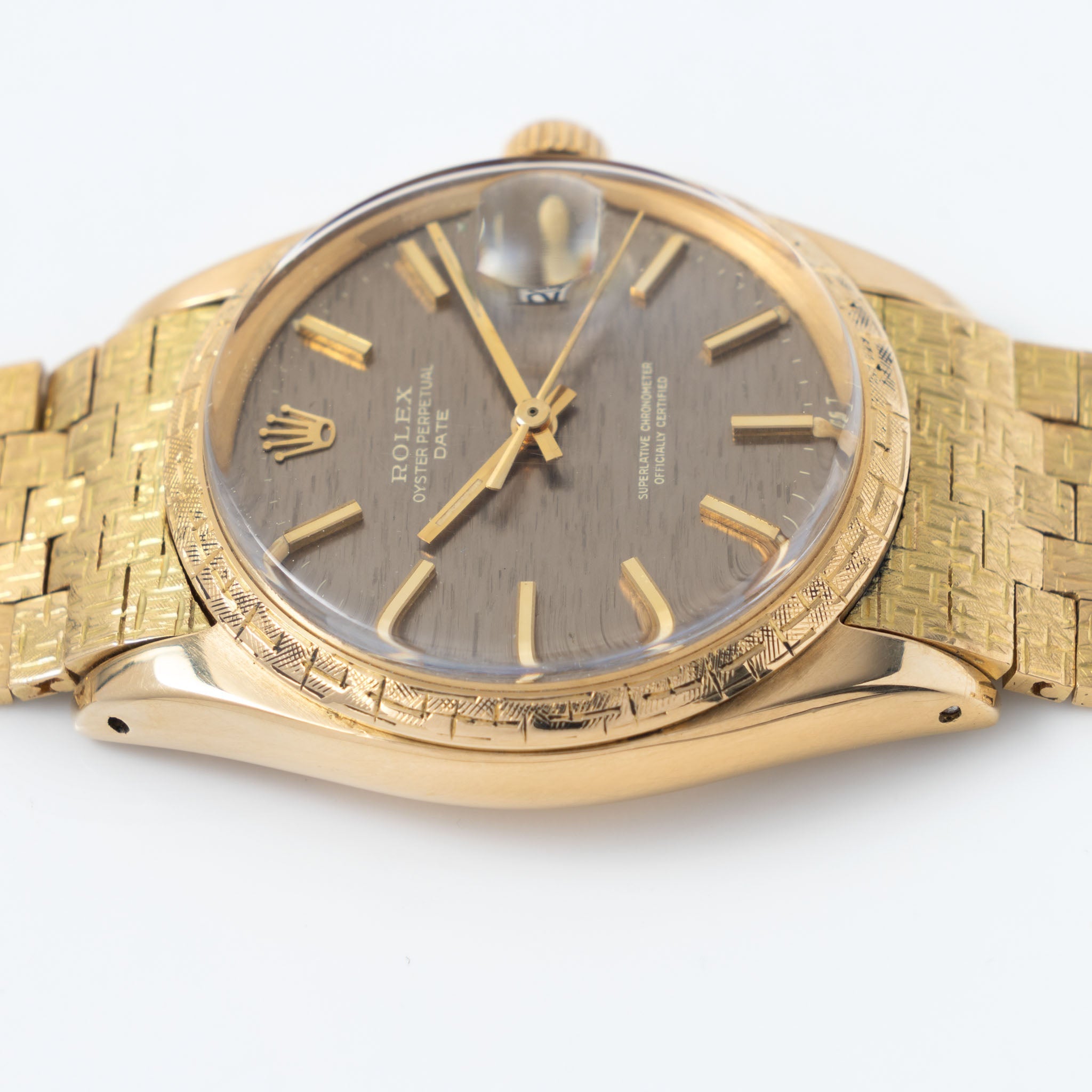Rolex Oyster Perpetual Date 1504 Grey Shantung Dial Moreau Finish with Brick Bracelet in 18k Yellow Gold