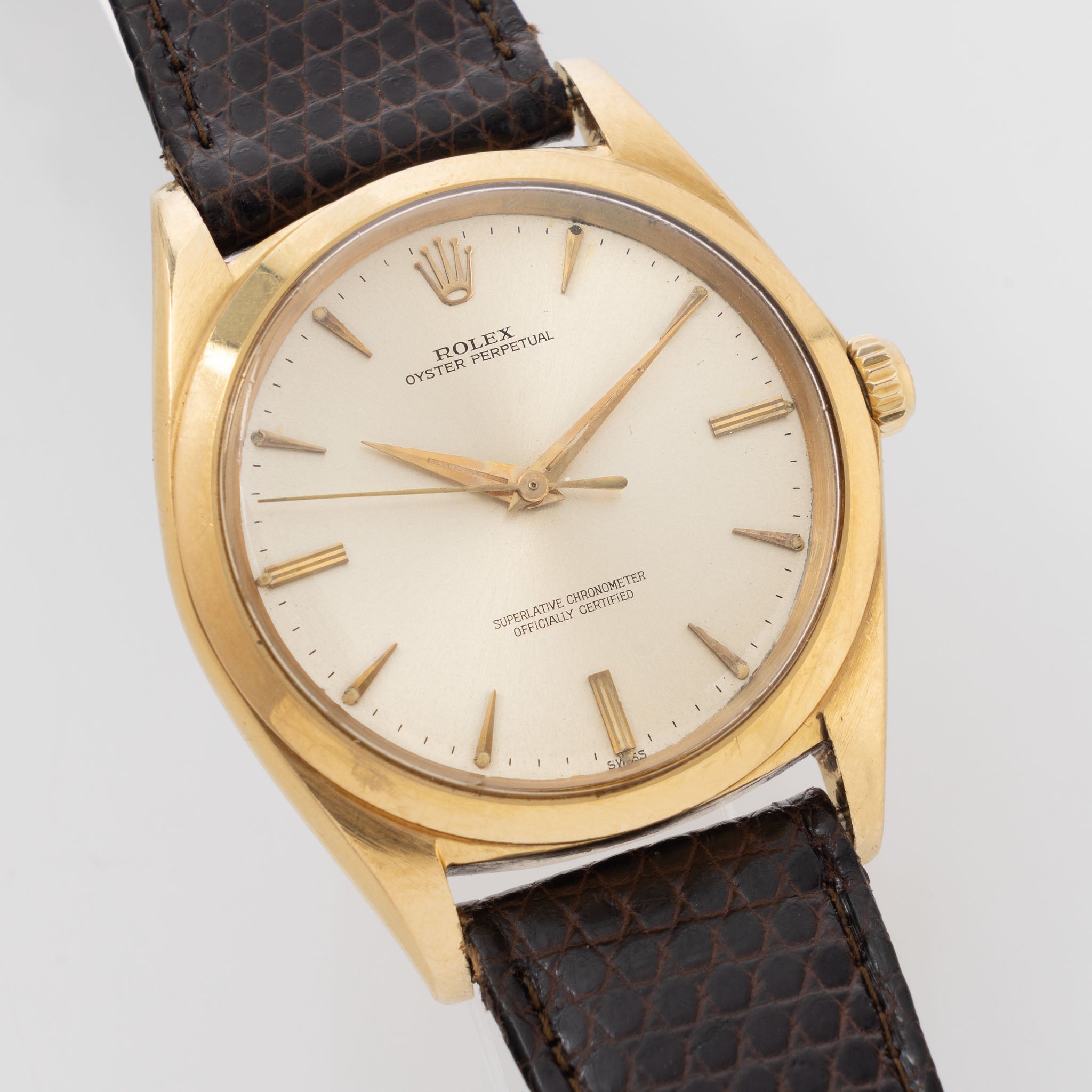 Rolex Oversized Oyster-Perpetual 1012 Silver Swiss Only Dial in 18k Yellow Gold - 36 mm