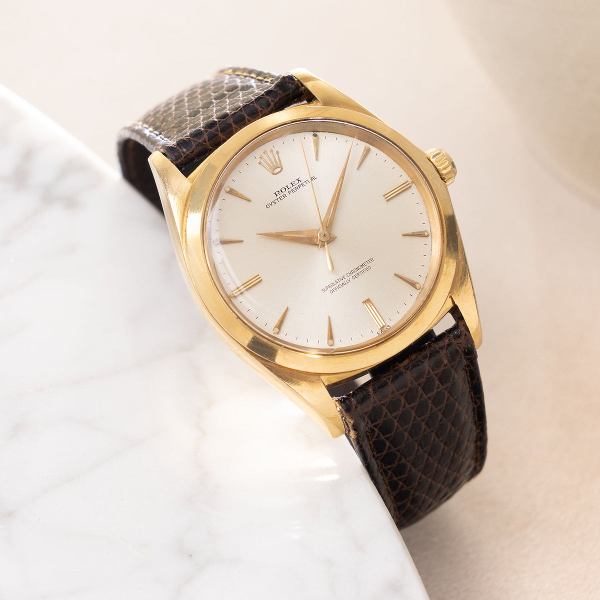 Rolex Oversized Oyster-Perpetual 1012 Silver Swiss Only Dial in 18k Yellow Gold
