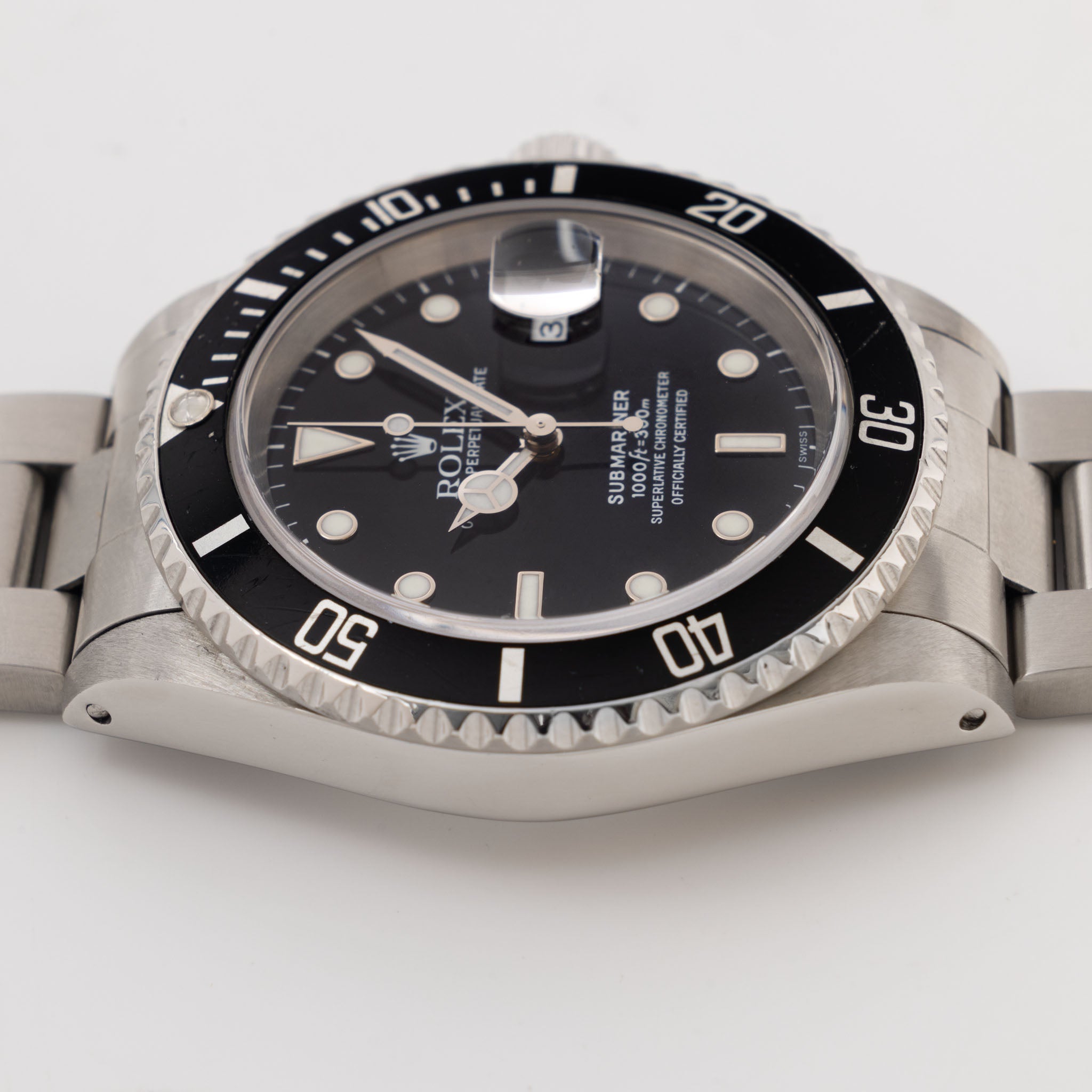 Rolex Submariner Date 16610 Swiss Only Dial with Original Guarantee Paper