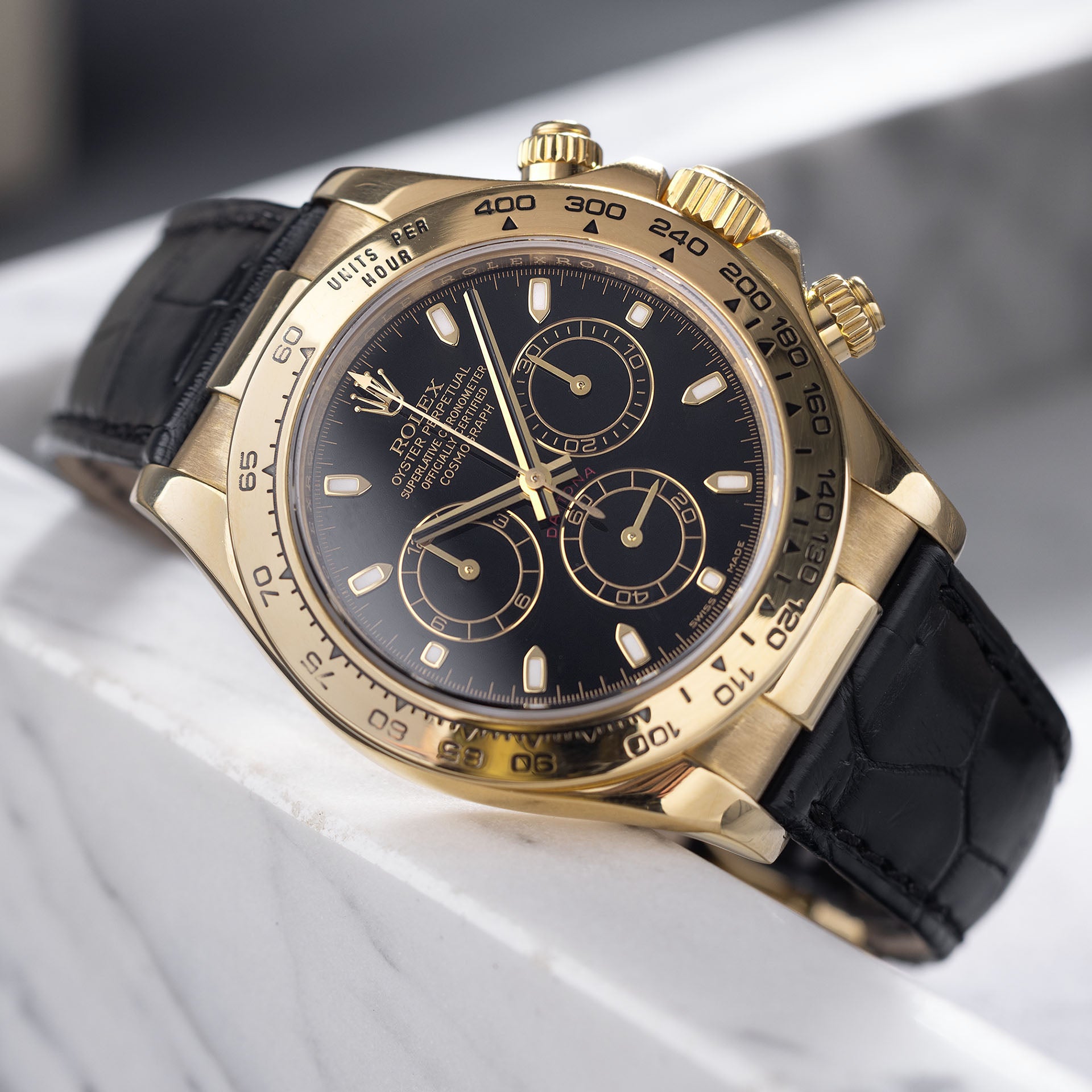 Rolex Daytona 116518 Gelbgold mit Schwarzem Zifferblatt auf Lederband