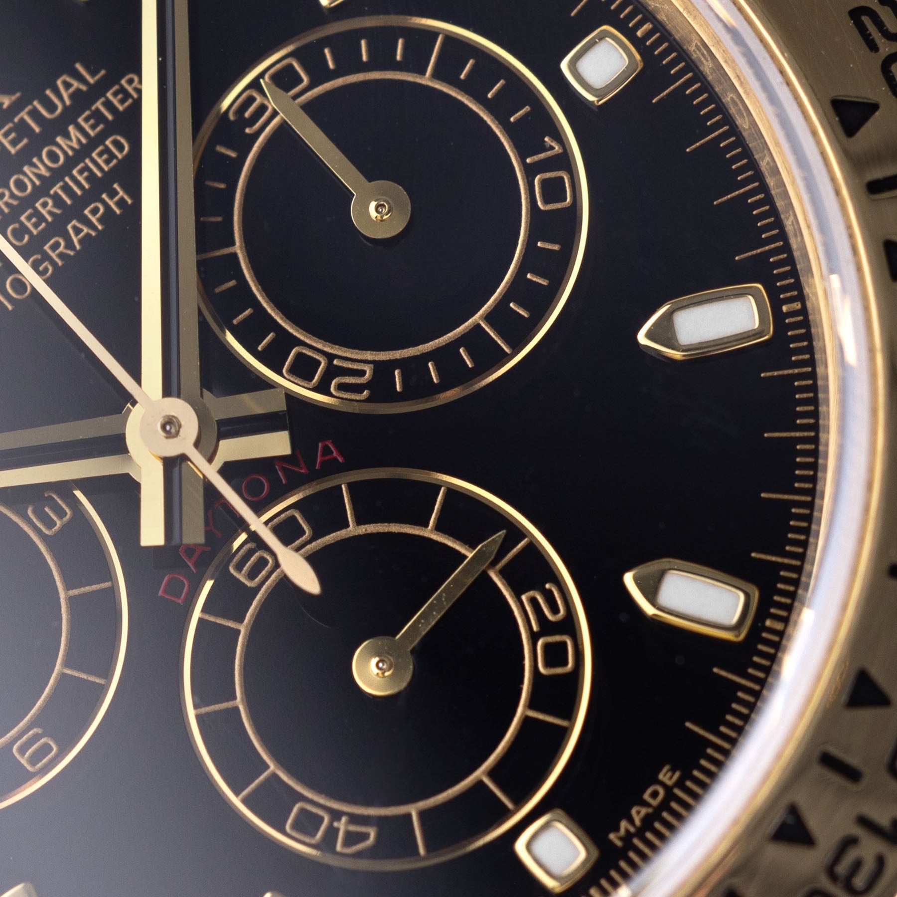 Rolex Daytona 116518 Gelbgold mit Schwarzem Zifferblatt auf Lederband