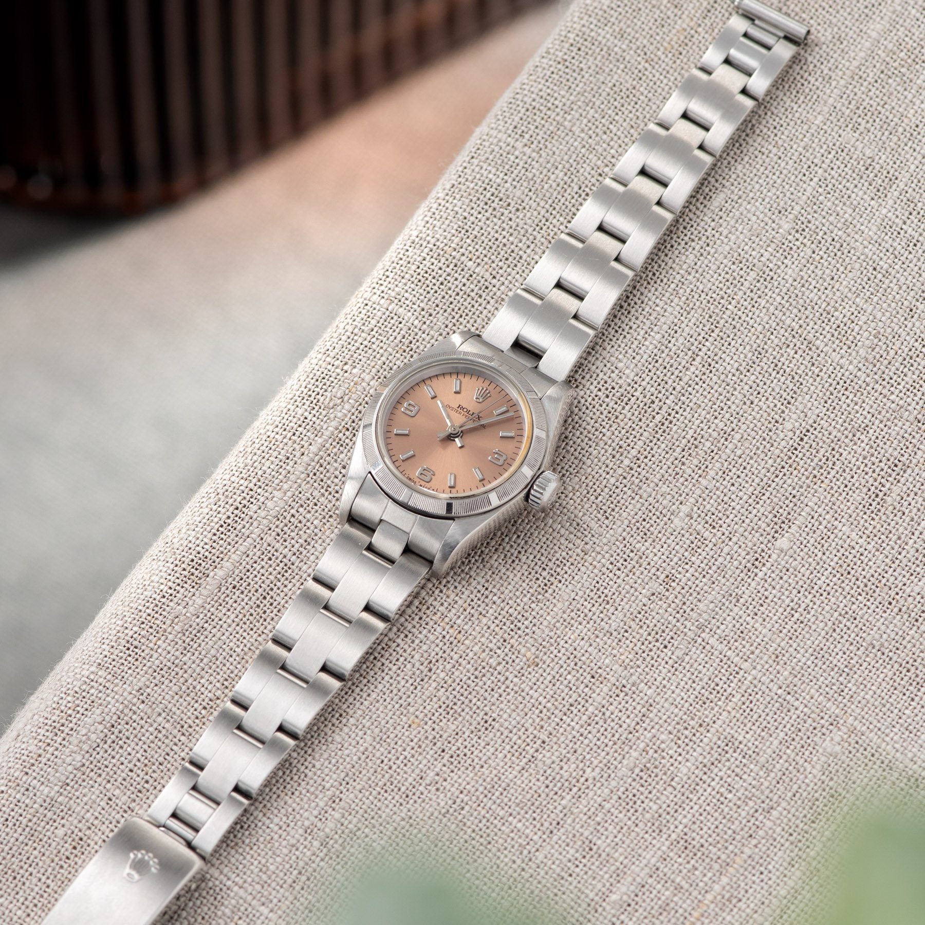 Rolex Oyster Perpetual Lady Ref 67230 Salmon Dial with a a solid-link Oyster bracelet