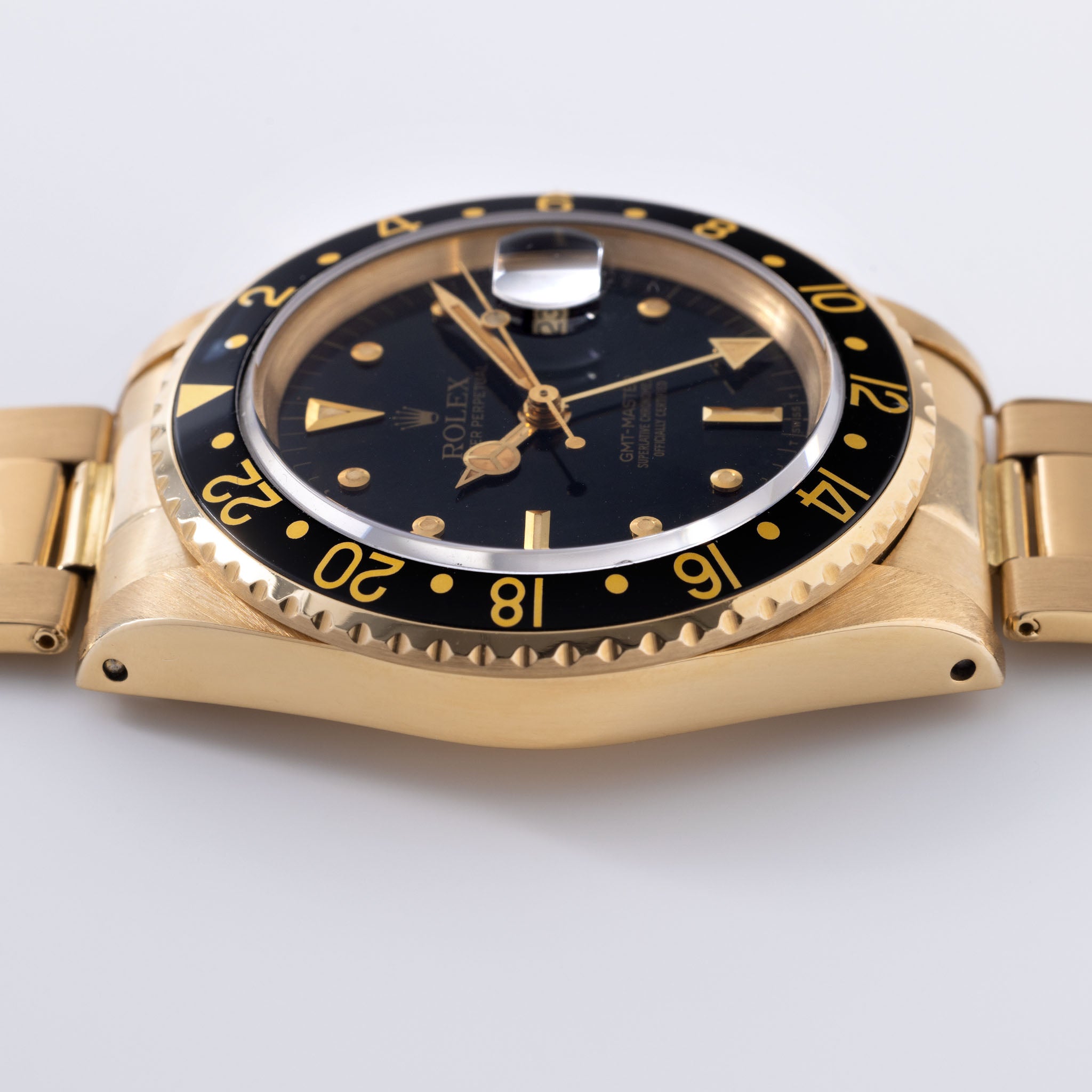 Rolex GMT-Master 16758 18 Karat Gelbgold schwarzes Nippel-Zifferblatt