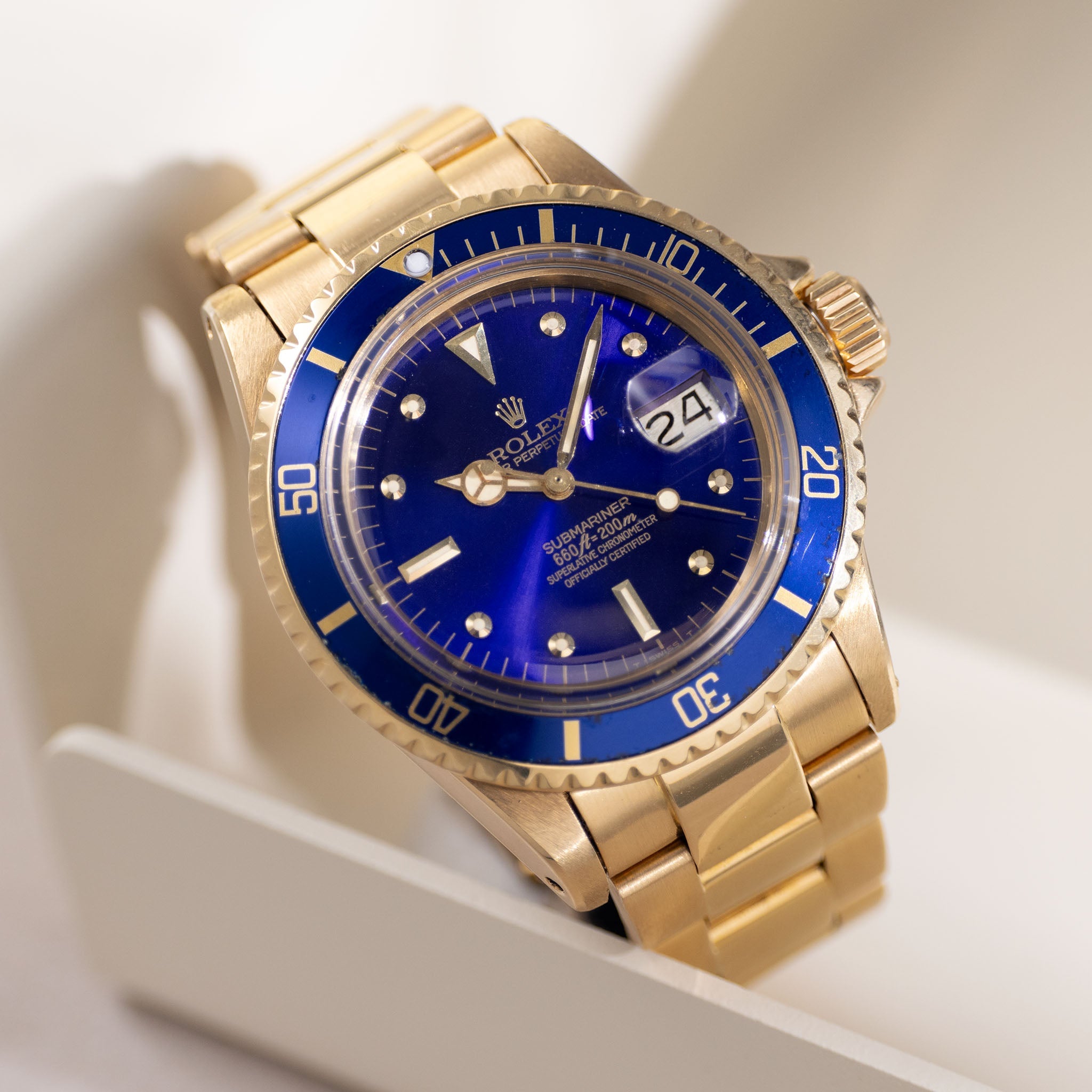 Rolex Submariner 1680/8 in 18k Yellow Gold with Blue "Nipple" Dial Turned Purple