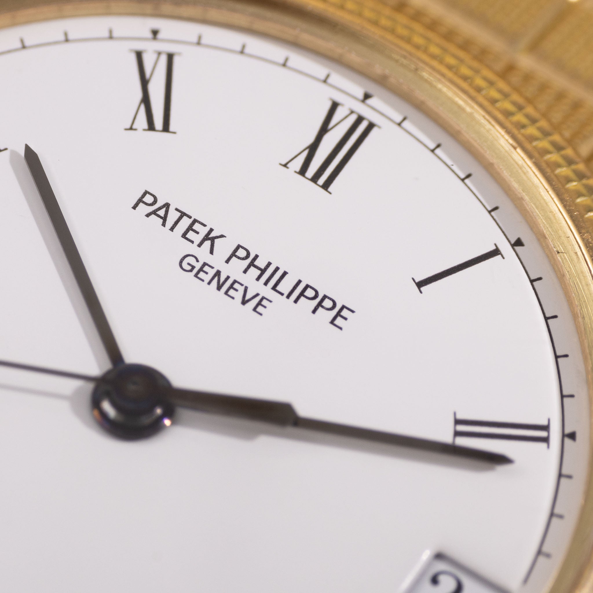 Patek Philippe Calatrava Automatic White Dial in 18k Yellow Gold Ref. 3802J with Integrated Bracelet