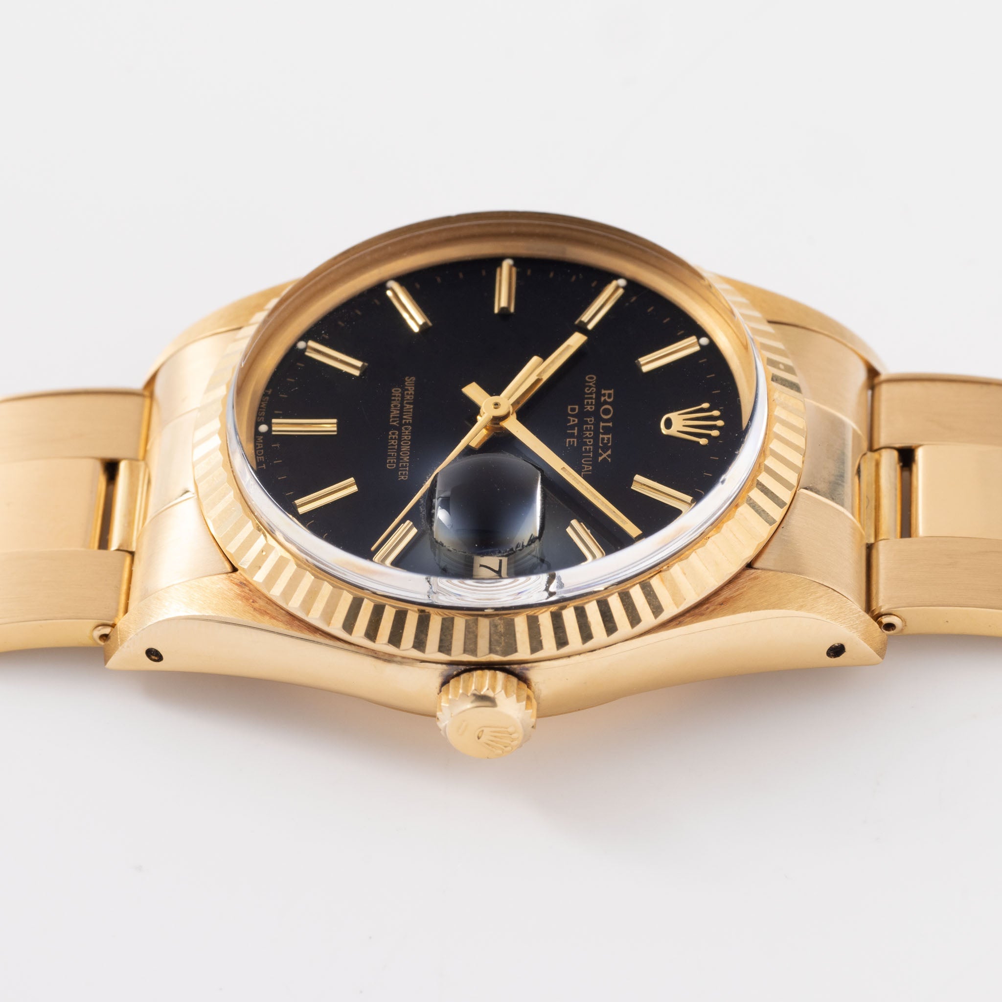 Rolex Oyster-perpetual date black dial  in 18 k yellow gold ref 15038