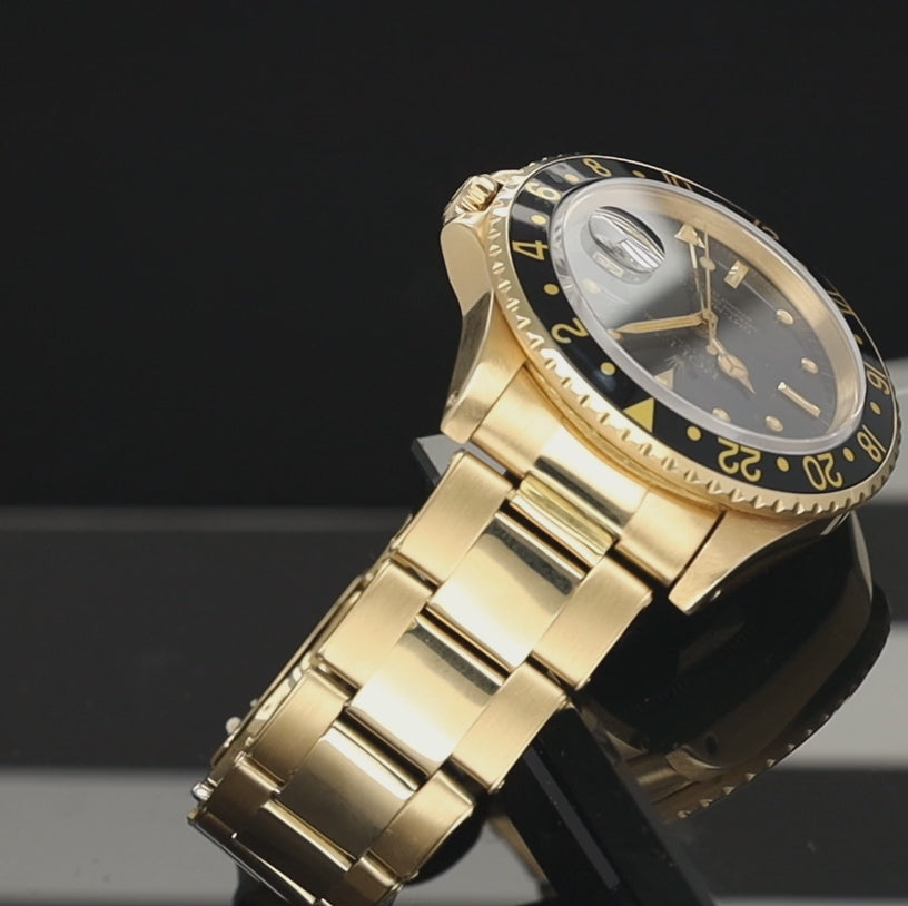 Rolex GMT-Master 16758 18 Karat Gelbgold schwarzes Nippel-Zifferblatt