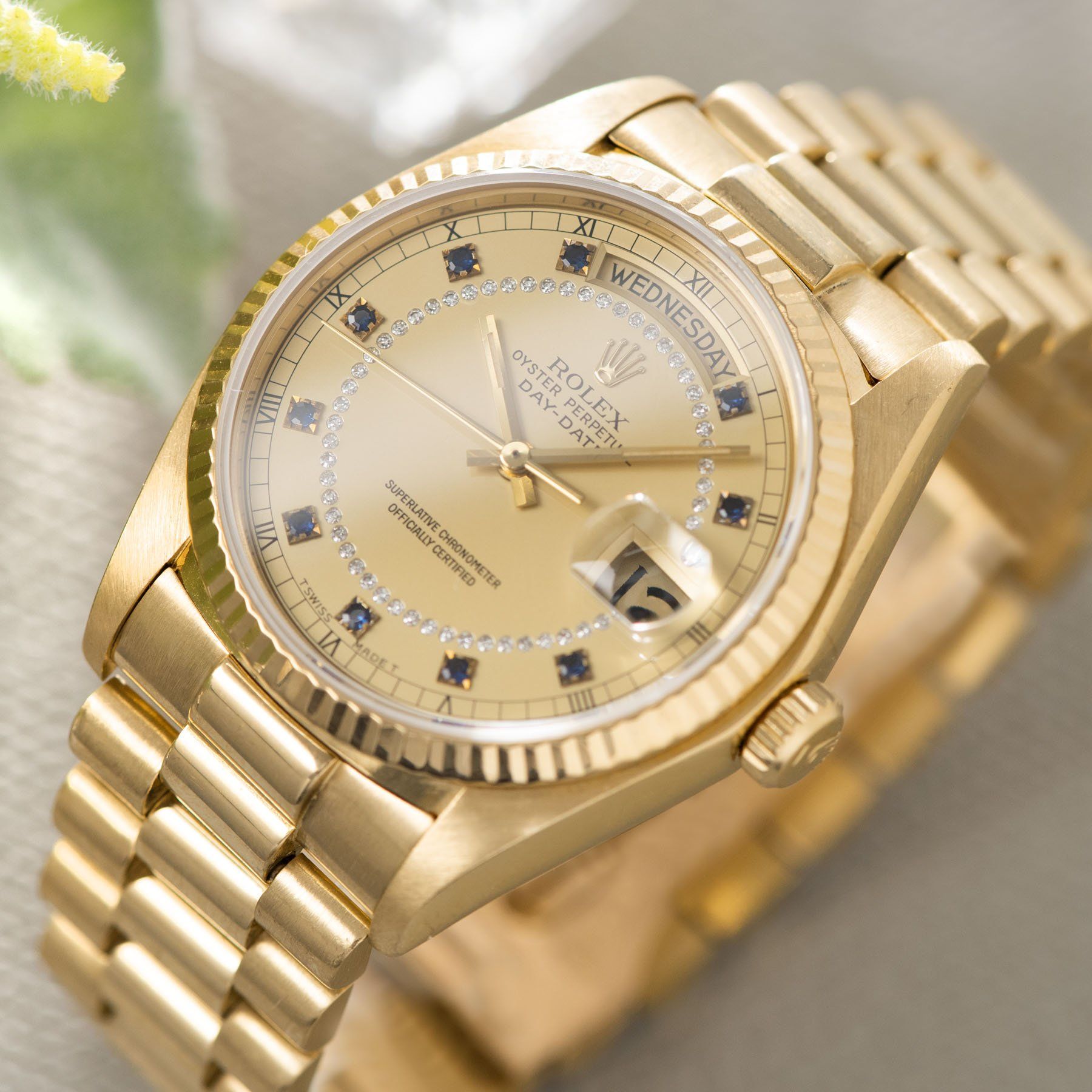 Rolex Day-Date Reference 18038 Blue Sapphire String Dial dating to 1986